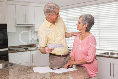 Senior couple paying their bills
