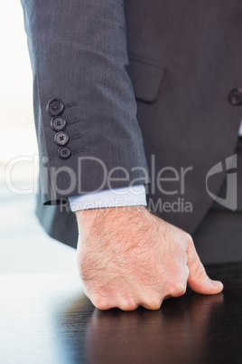 Angry businessman thump the table