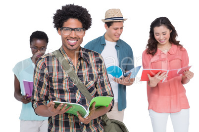 Stylish students smiling at camera together