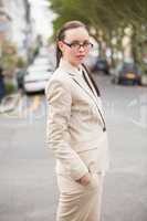 Young businesswoman looking at camera