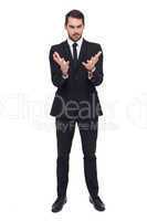 Elegant businessman in suit gesturing