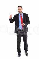 Smiling businessman giving thumbs up