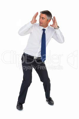 Businessman bending and with head between hands