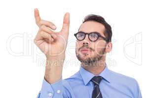 Businessman in shirt measuring something with his fingers