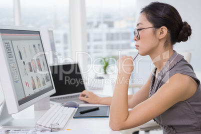 Photo editor working at her desk