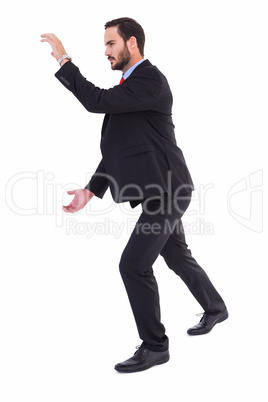 Businessman showing something with his hands