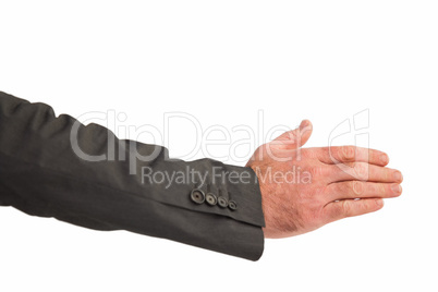 Businessman reaching hand out