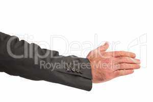 Businessman reaching hand out