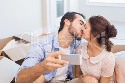 Cute couple taking a selfie