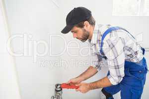 Plumber fixing tap with wrench