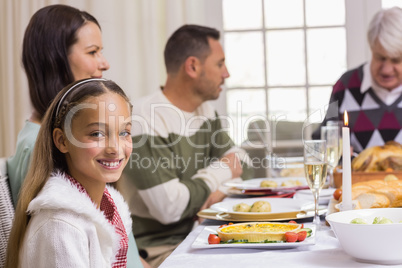 Portrait of a smiling girl at christmas dinner