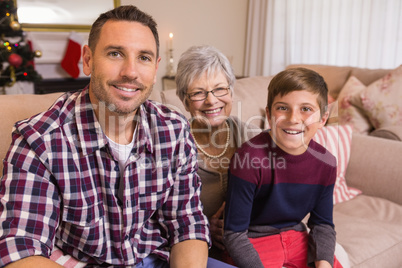 Portrait of grandmother father and son