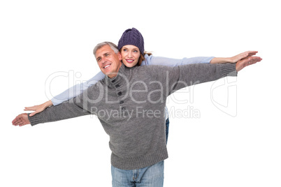 Carefree couple in warm clothing