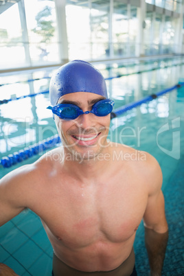 Fit swimmer in pool at leisure center