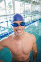 Fit swimmer in pool at leisure center