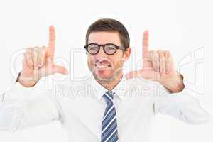 Businessman pointing with his fingers