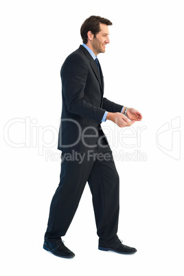 Handsome businessman holding hand out