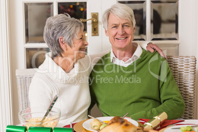 Portrait of a happy senior couple hugging Portrait of a happy senior couple hugging