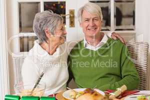 Portrait of a happy senior couple hugging