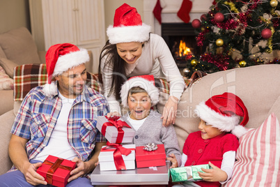 Surprised son opening his gifts