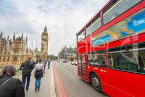 Double Decker bus crossing crowded Westminster Bridge