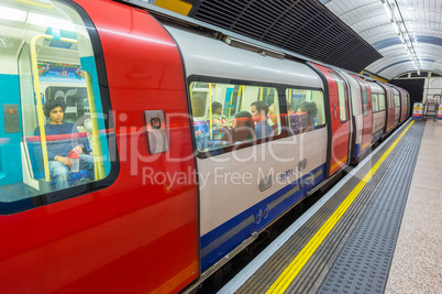 LONDON - SEPTEMBER 28, 2013: Subway train in underground station