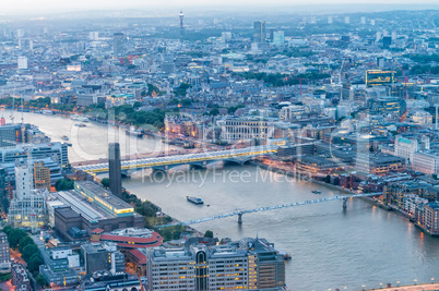 London at night. Aerial city view with Thames river and building
