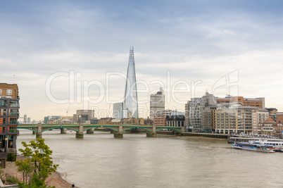 London skyline and Thames river on a cloudy day
