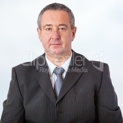 Portrait of elderly man in elegant suit