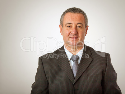 Portrait of elderly man in elegant suit