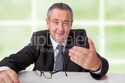 Man sitting at desk and discussed