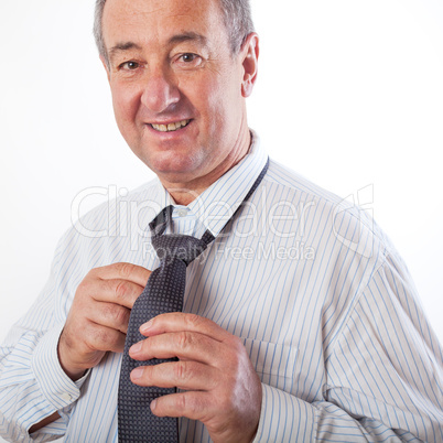 Businessman binds the tie