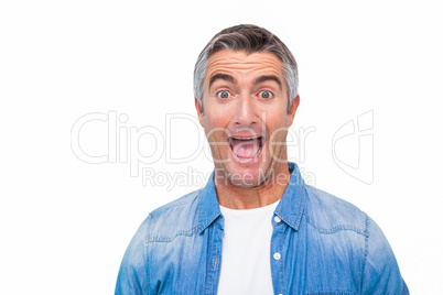 Portrait of a excited man in casual clothes