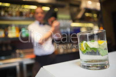 Close up of a mojito at bar counter