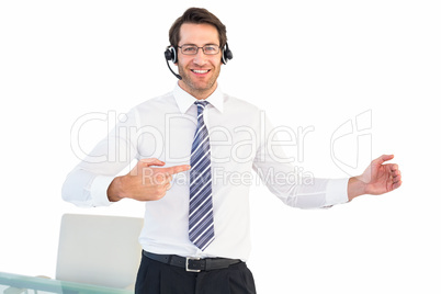 Businessman using a headset while presenting with hands