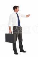 Businessman checking the time while holding briefcase