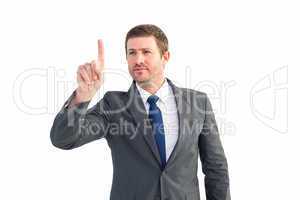 Focused businessman pointing with finger