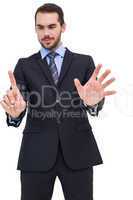 Businessman presenting number six with his fingers