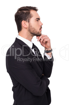 Thoughtful businessman touching his chin