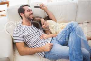 Cute couple relaxing on couch