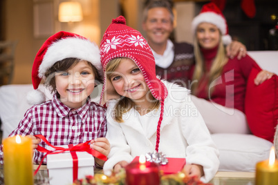 Cute family celebrating christmas together