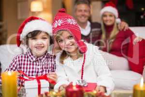 Cute family celebrating christmas together