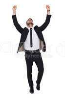 Cheerful businessman with arms up cheering
