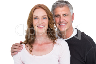 Casual couple smiling at camera Casual couple smiling at camera