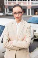 Young businesswoman looking at camera