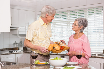 Senior couple preparing lunch together