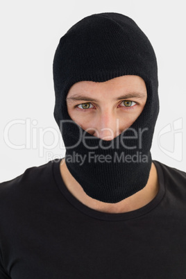 Portrait of burglar wearing a balaclava