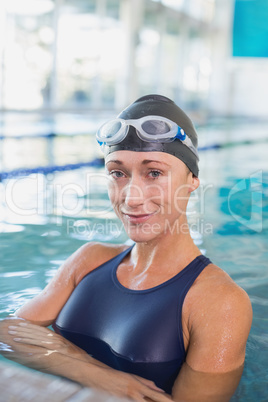 Fit swimmer in the pool at leisure center