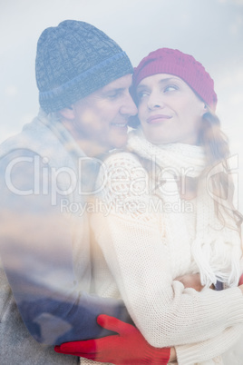 Happy couple in warm clothing