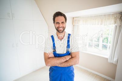 Handyman smiling at camera